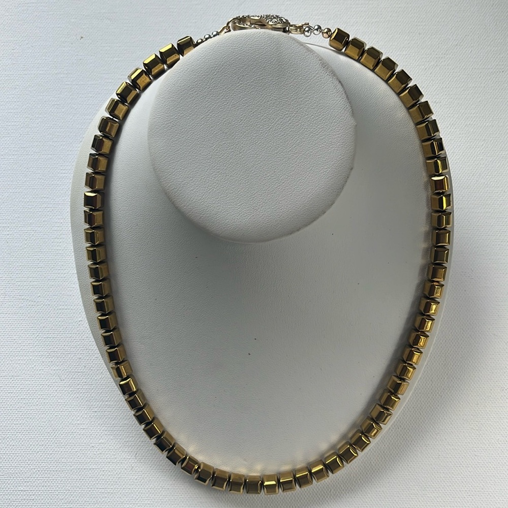 Gold hematite cube necklace. 22” long. Large brass and crystal lobster claw hook